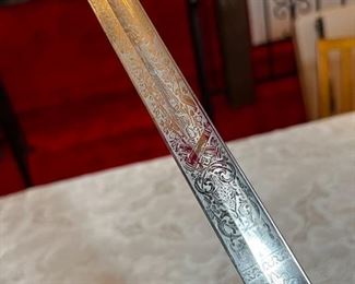 Vintage Military Officers Dress Sword	Blade length 34 in. Total length 39 .25 in	
