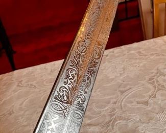 Vintage Military Officers Dress Sword	Blade length 34 in. Total length 39 .25 in	
