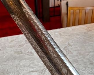 Vintage Military Officers Dress Sword	Blade length 34 in. Total length 39 .25 in	
