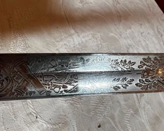 Vintage Military Officers Dress Sword	Blade length 34 in. Total length 39 .25 in	
