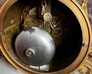 French Antique three piece marble, and gold mantle clock and candlesticks Medaille D’ Argent Crystal	Clock measurements: 27.5 inches, tall, 14.5 inches wide, 4.5 inches deep. Candlestick measurements: 26” x 10” x 10”.	
