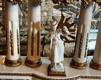 French Antique three piece marble, and gold mantle clock and candlesticks Medaille D’ Argent Crystal	Clock measurements: 27.5 inches, tall, 14.5 inches wide, 4.5 inches deep. Candlestick measurements: 26” x 10” x 10”.	
