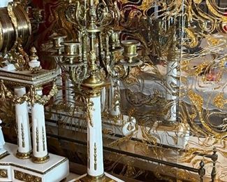 French Antique three piece marble, and gold mantle clock and candlesticks Medaille D’ Argent Crystal	Clock measurements: 27.5 inches, tall, 14.5 inches wide, 4.5 inches deep. Candlestick measurements: 26” x 10” x 10”.	
