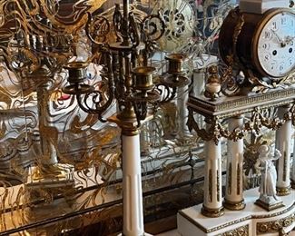 French Antique three piece marble, and gold mantle clock and candlesticks Medaille D’ Argent Crystal	Clock measurements: 27.5 inches, tall, 14.5 inches wide, 4.5 inches deep. Candlestick measurements: 26” x 10” x 10”.	
