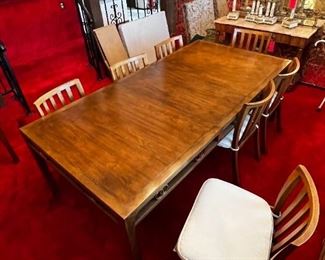 Baker furniture dining room table w leaf & 8 chairs	Without leaf: 28.5 x 42 x 66 with leaf: 28.5 x 42 x  84 chairs 31.25 x 20 x 18.5 seating height 18in	HxWxD
