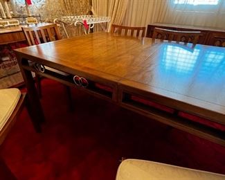 Baker furniture dining room table w leaf & 8 chairs	Without leaf: 28.5 x 42 x 66 with leaf: 28.5 x 42 x  84 chairs 31.25 x 20 x 18.5 seating height 18in	HxWxD
