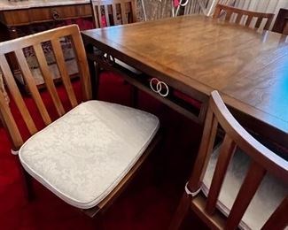 Baker furniture dining room table w leaf & 8 chairs	Without leaf: 28.5 x 42 x 66 with leaf: 28.5 x 42 x  84 chairs 31.25 x 20 x 18.5 seating height 18in	HxWxD
