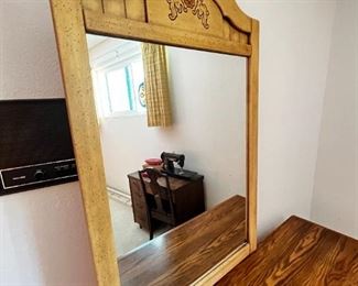 Nine drawer console dresser with mirror	Console dresser measurements, 30.5 x 70.5 x 19 mirror measurements 49.5 x 32.	
