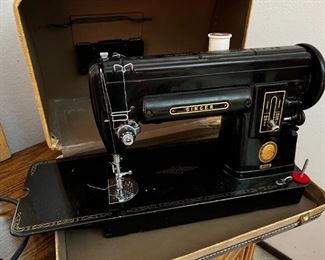 Singer 301 A sewing machine with case & pedal & accessories	11.5 x 19 x 7.	HxWxD
