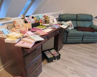 Green leather reclining loveseat. Lots of stationery and greeting/note cards. Many new in the package.