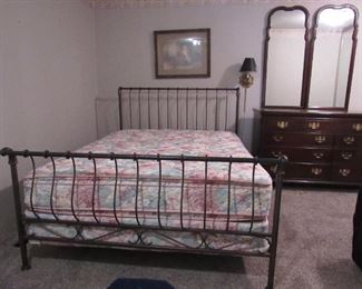 Queen size metal sleigh type bed. Queen mattress and box spring in like new condition.