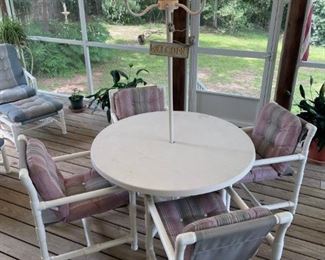 Patio Table w light, 4 chairs plus 2 occasional chairs w/ottomans   Table 47" diameter         (Mauve & Gray)                                                                                          $250.00 for 9 pieces