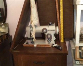 Sewing machine in cabinet