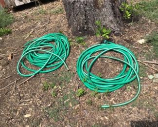 Between storage buildings - hoses