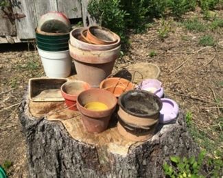 Between storage buildings - pots & containers
