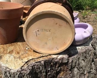 Planter from Italy between storage buildings