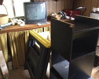 First storage building - TV, bench, and more