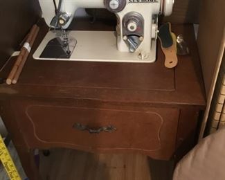 Bedroom - New Home sewing machine in cabinet 