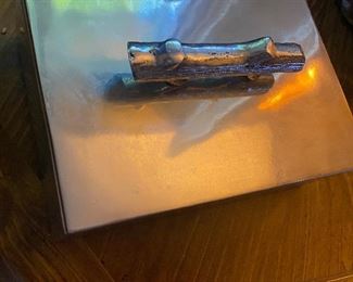 silver trinket box with log pull. 