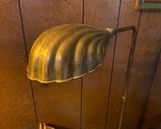 Brass shell floor lamp.