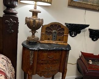 One of a pair of marble top French table