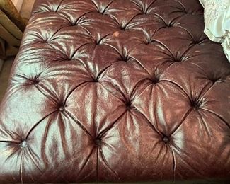 Leather button tufted ottoman