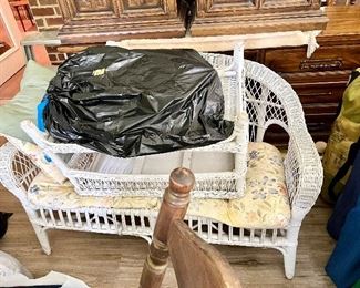 Nice wicker loveseat and coffee table 