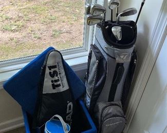 Golf clubs and tennis racket 