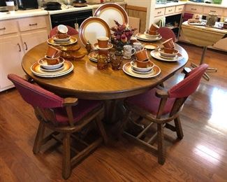 Dining table & cloth upholstered chairs.  Stoneware dish set