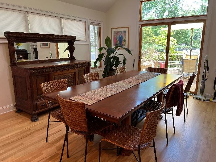 Wood Rectangular Dinner Table with 2 leaves..
6 matching wicker/Metal chairs