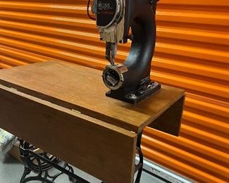 THE BOSS Hand Stitcher leather machine.  Like new!
Attached to a very sturdy stand. $950