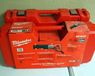 Milwaukee Sawzall, Model 6519-31, New In Hard Sided Carrying Case, And Empty Storage Case