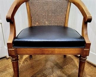 vintage caned-back arm chair