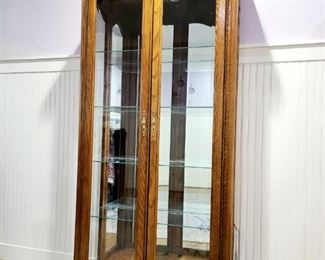 Oak lighted display cabinet $245 or bid #21