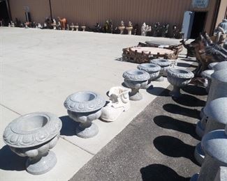 Assorted styles and sizes of planters to choose from