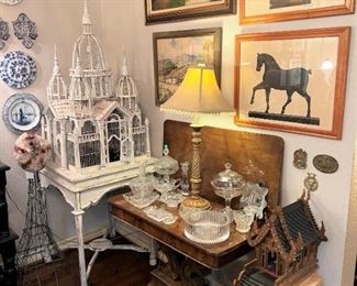 Handmade birdcage on table stand