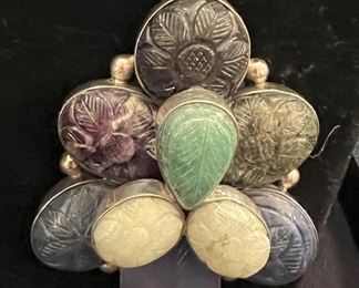 Carved semi-precious stone pendant