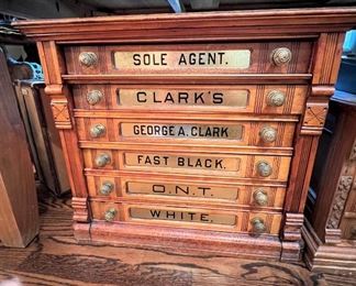 Six drawer antique spool cabinet