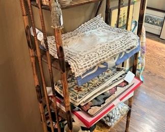 Victorian burned bamboo shelf; vintage linens