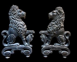Pair of large iron lion mounts 