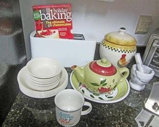 Toaster, dishes, mortar & pestle, and decorative accessories 