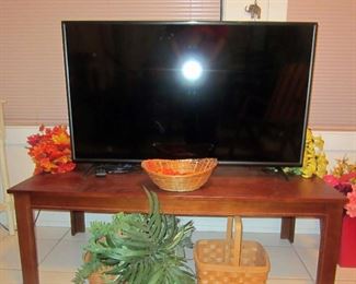 Vizio 42" LCD television on coffee table (has matching end tables) or bench 