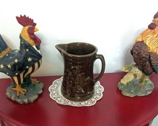 Large roosters and pitcher