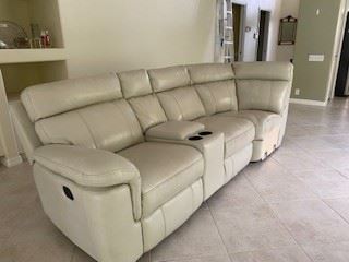 $150 - Leather Sectional Sofa with two recliners, cup holders and storage. (Photo 1 of 2)