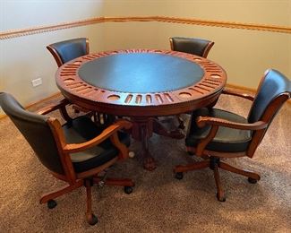 Game table - poker, bumper pool, and solid table on flip side - great condition!  29.5"H x 54" diameter,  $499