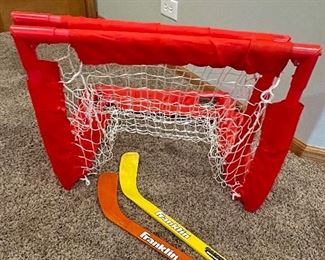Pair of hockey nets with plastic sticks,  was $14, NOW $9
