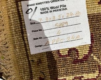 Label on the back of the rug.