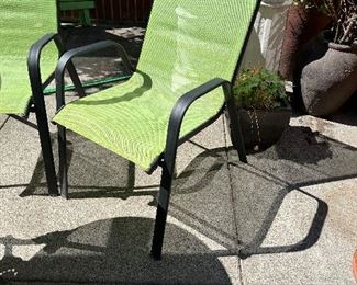 $80 Set of four outdoor stacking chairs.