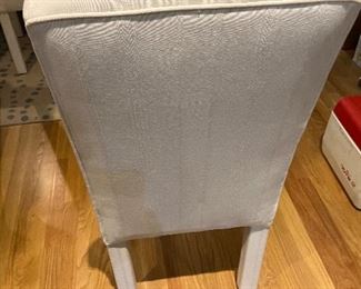 A view of the back of the parsons chairs.