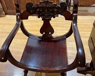 $360. Antique chair 23.5 inches wide by 23 inches deep by 33 inches high.  Beautiful carved detailing on legs and bak of the chair